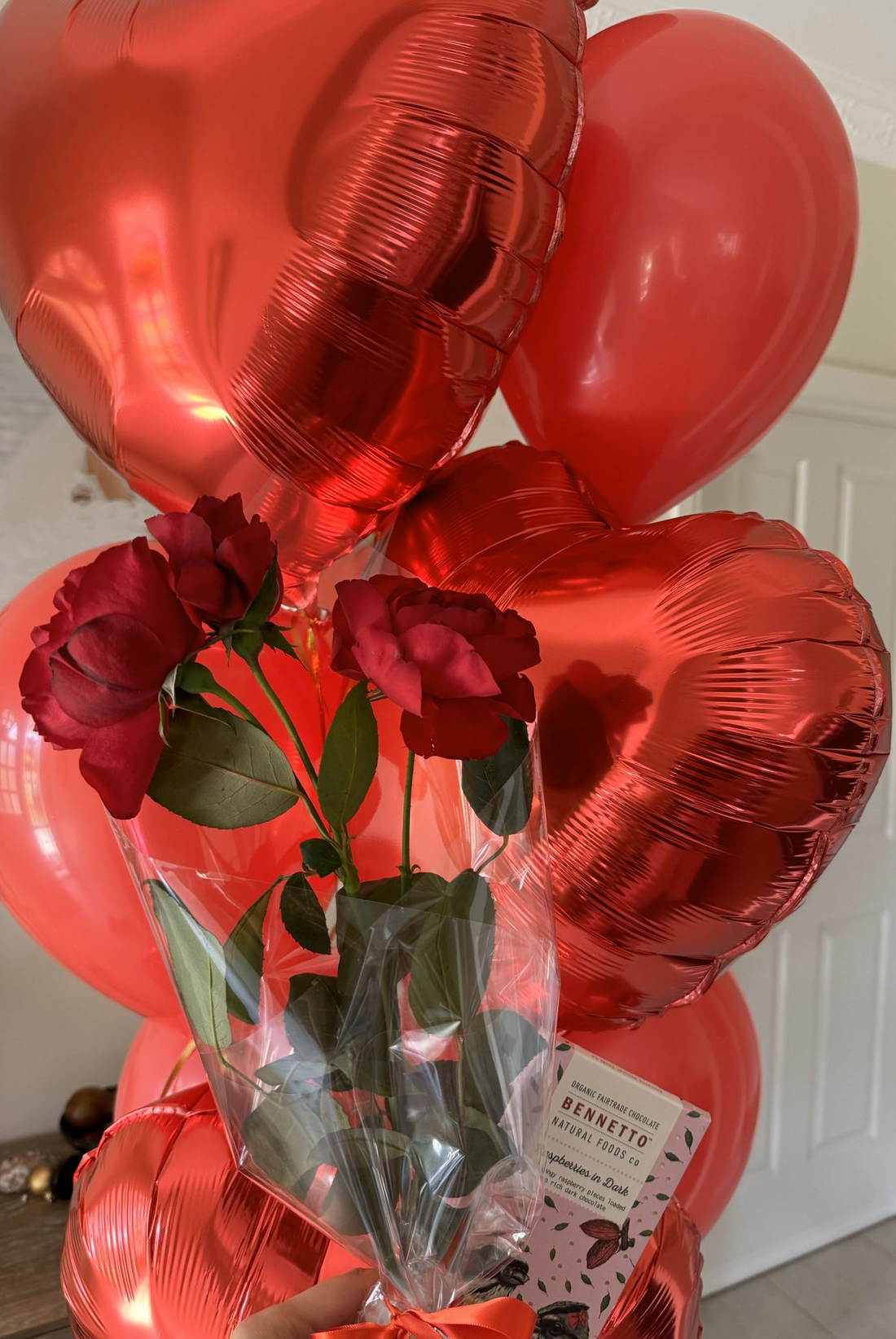 Valentines Day Love Hearts Balloons with Red Roses and a Chocolate Bar