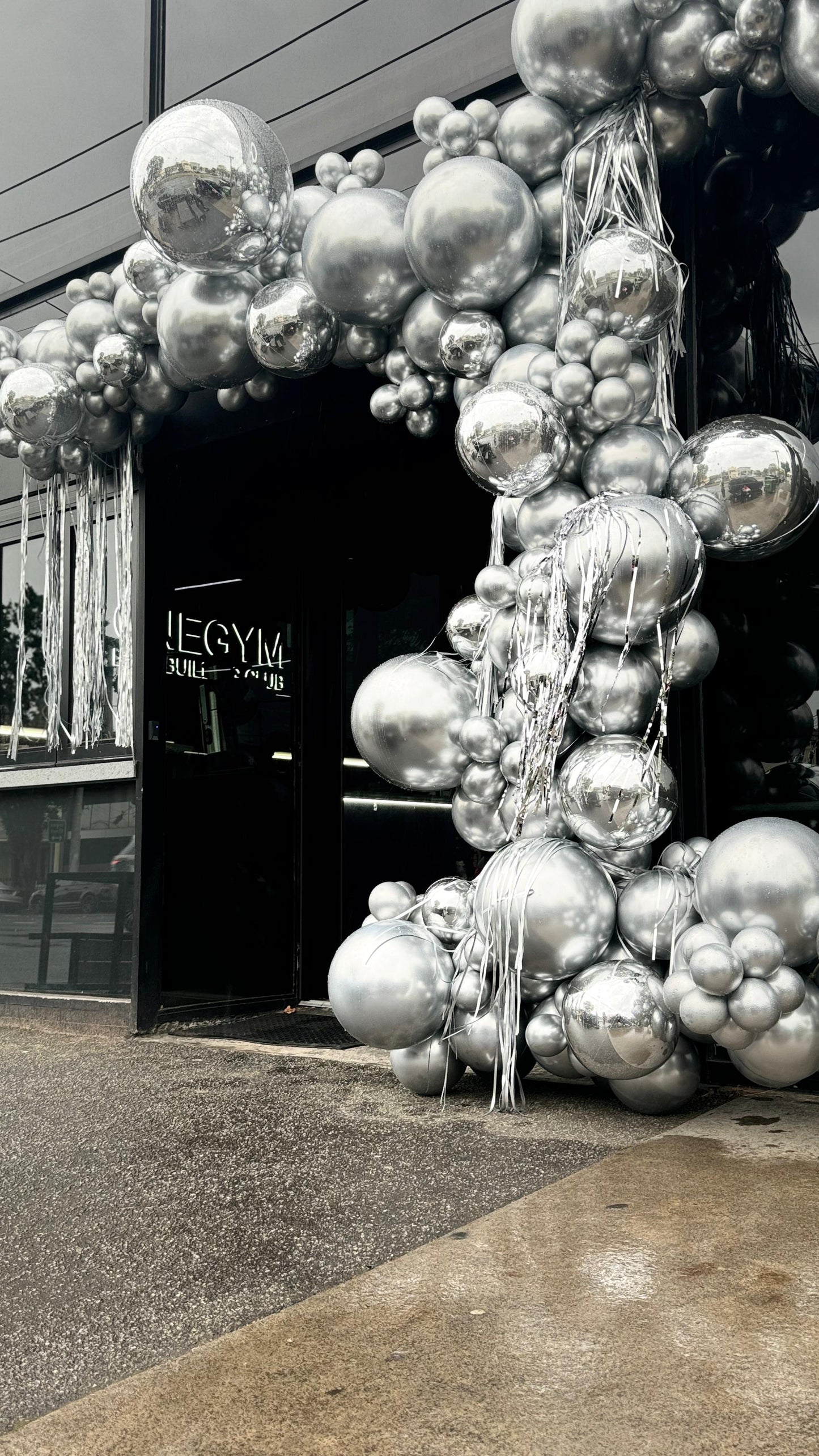 Balloon garland at the store front of One Gym Port Melbourne