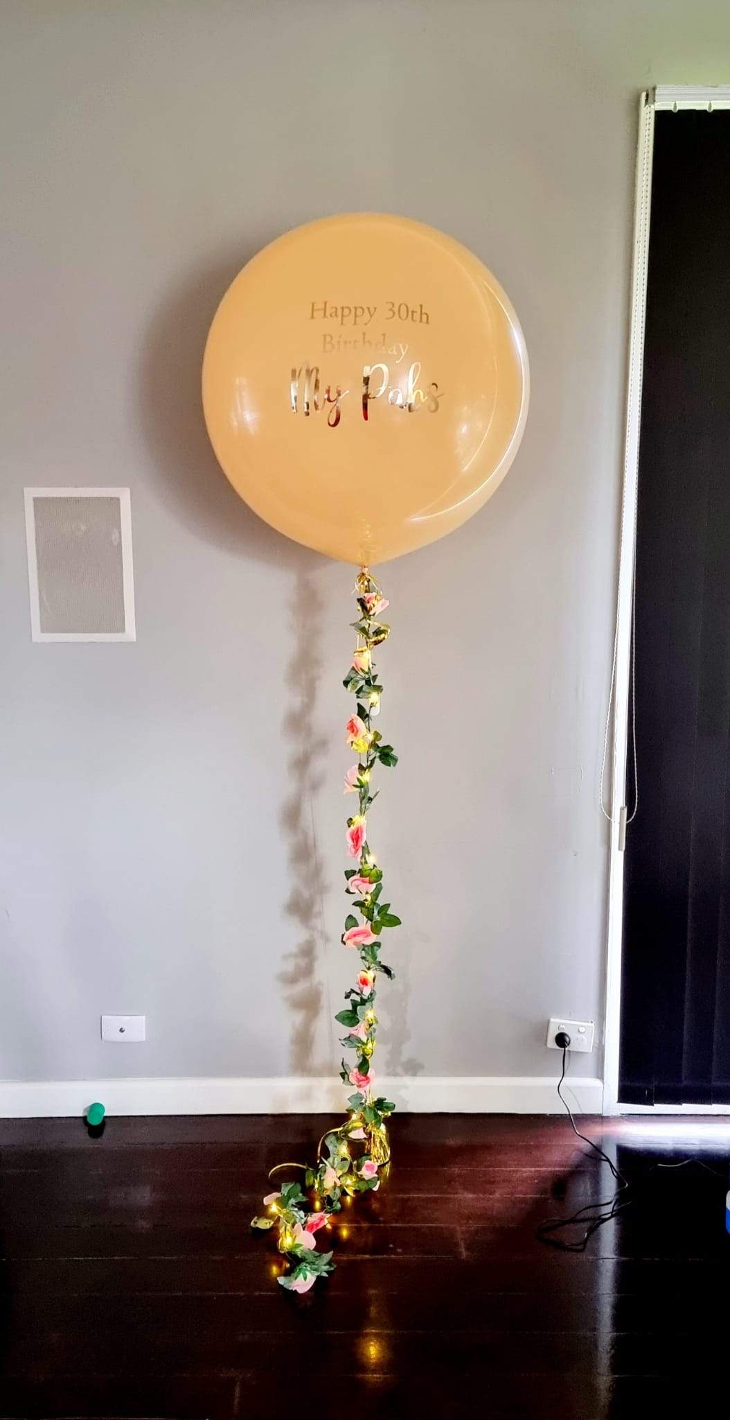 Peach XL Bubble Balloon with an Illuminated Floral Garland Delivered Melbourne