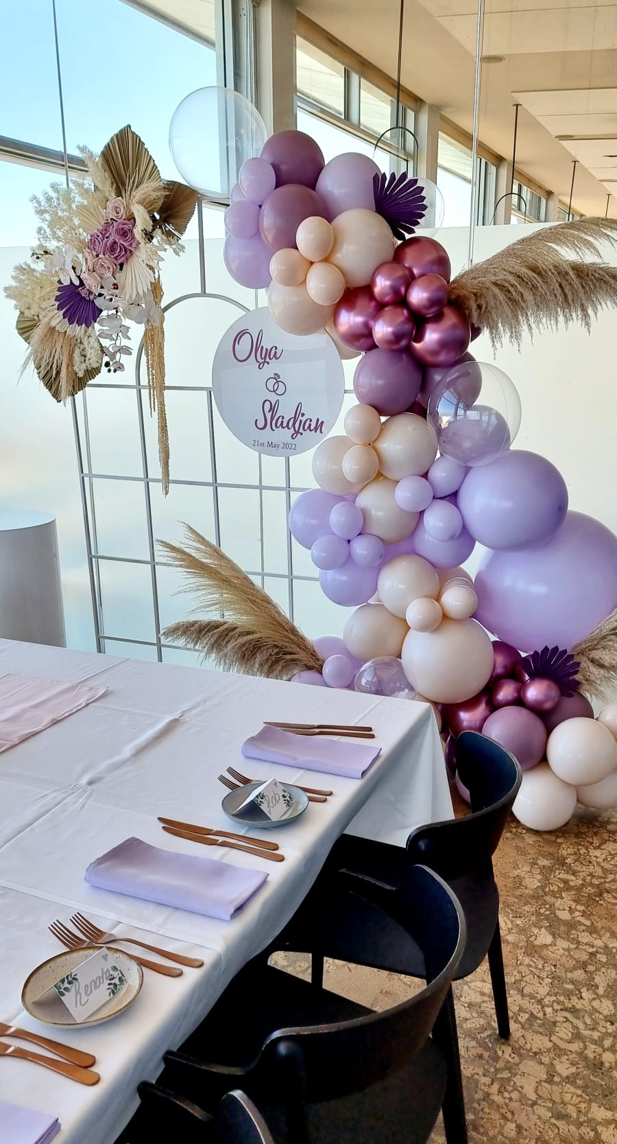 Window Arch Backdrop with an Organic Balloon Garland and Dry Flower Arrangement Melbourne