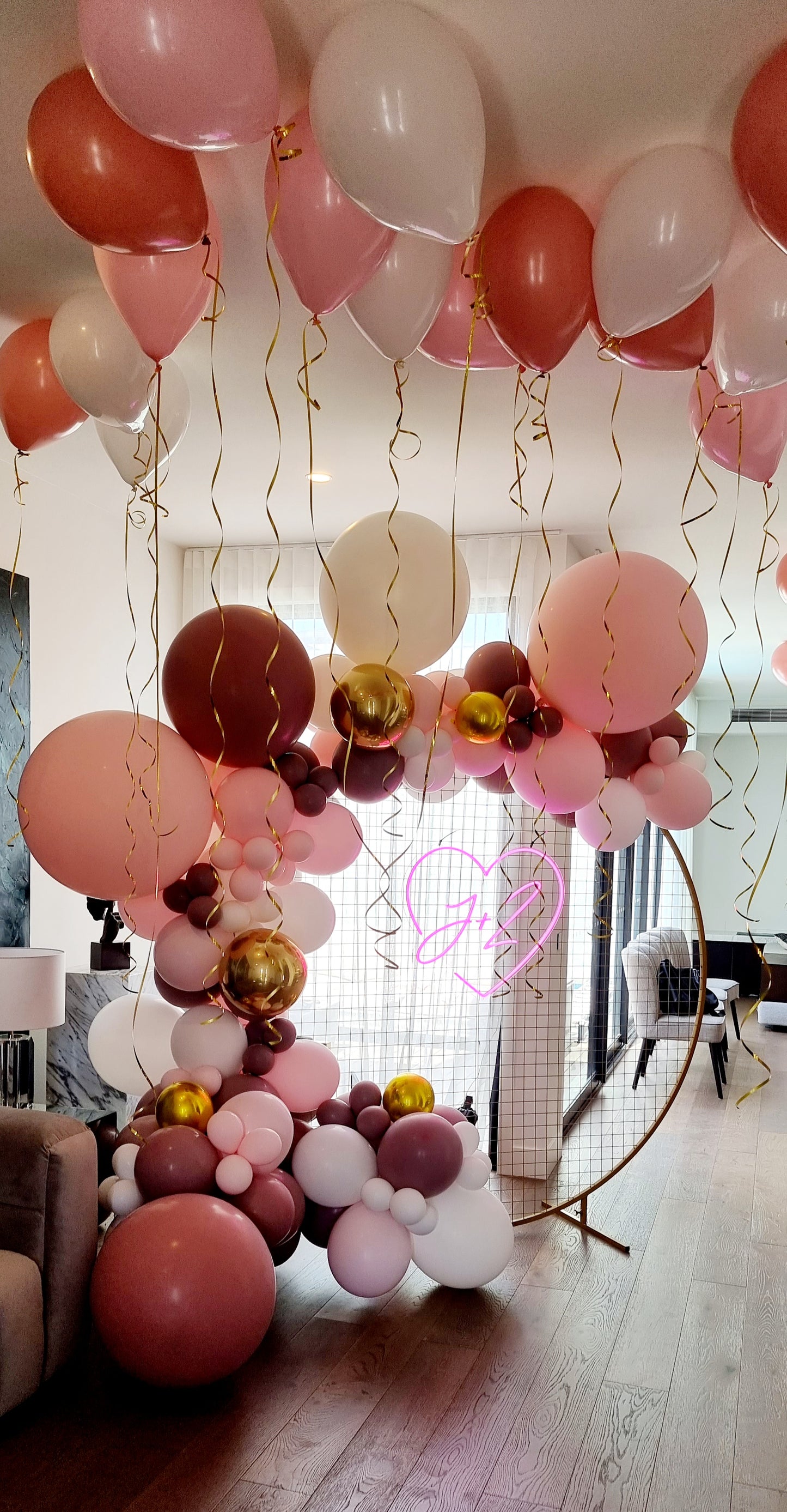 Red white and pink balloon garland in Mentone